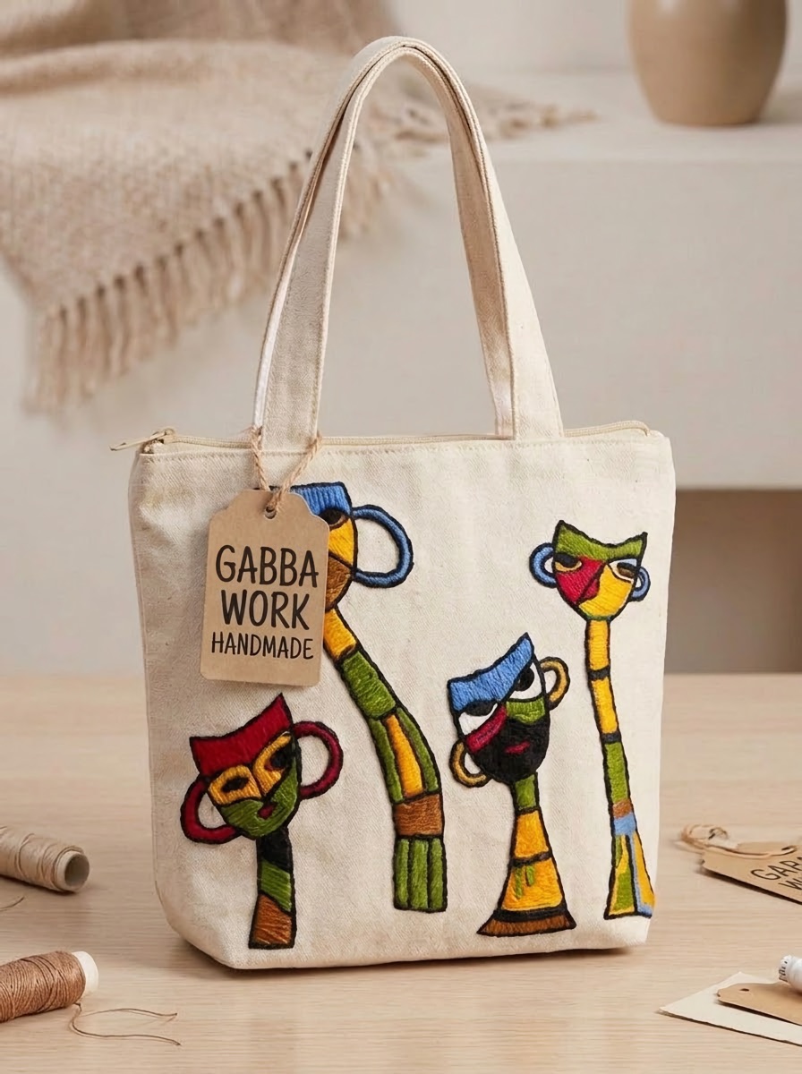 Embroidered tote bag, abstract faces